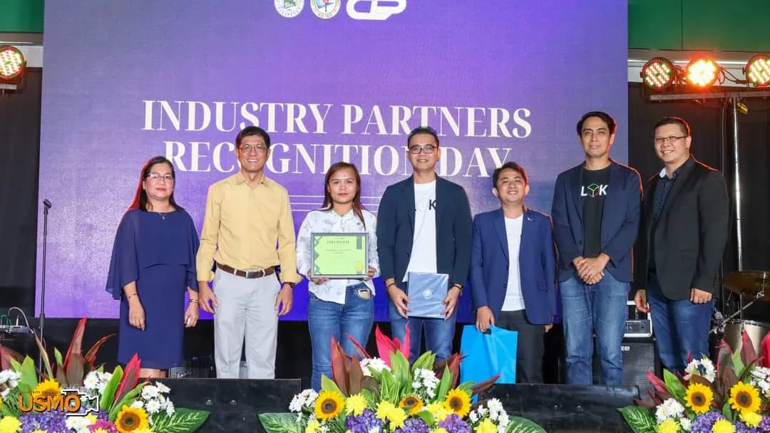 The BLOKC honored on stage at the University of Makati Industry Partners Recognition Day.