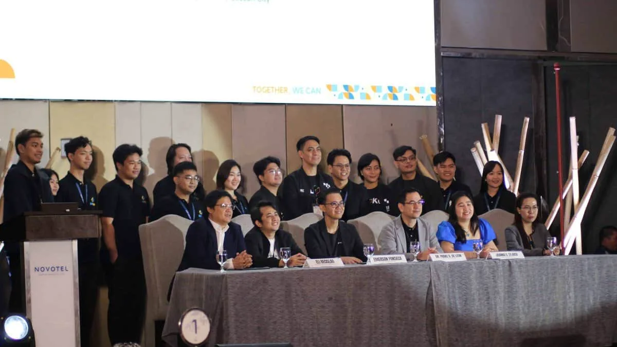 The BLOKC team and academic and industry partners on a panel at a partnership conference.
