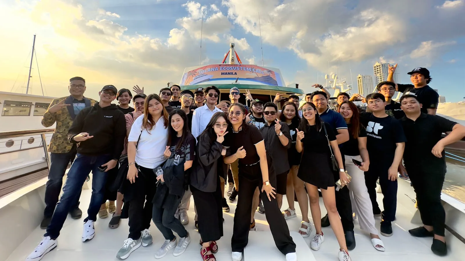 A large Solana Superteam Philippines community gathered on the deck of a yacht for the Solana Ecosystem Cruise in Manila.