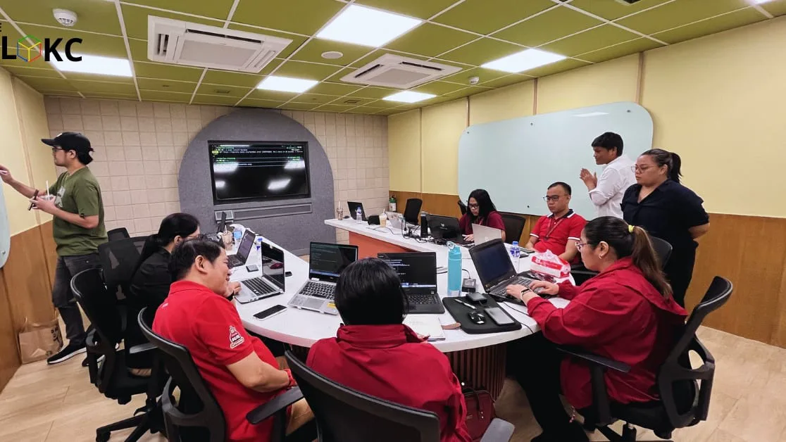 Corporate training participants collaborate during a The BLOKC blockchain workshop session.